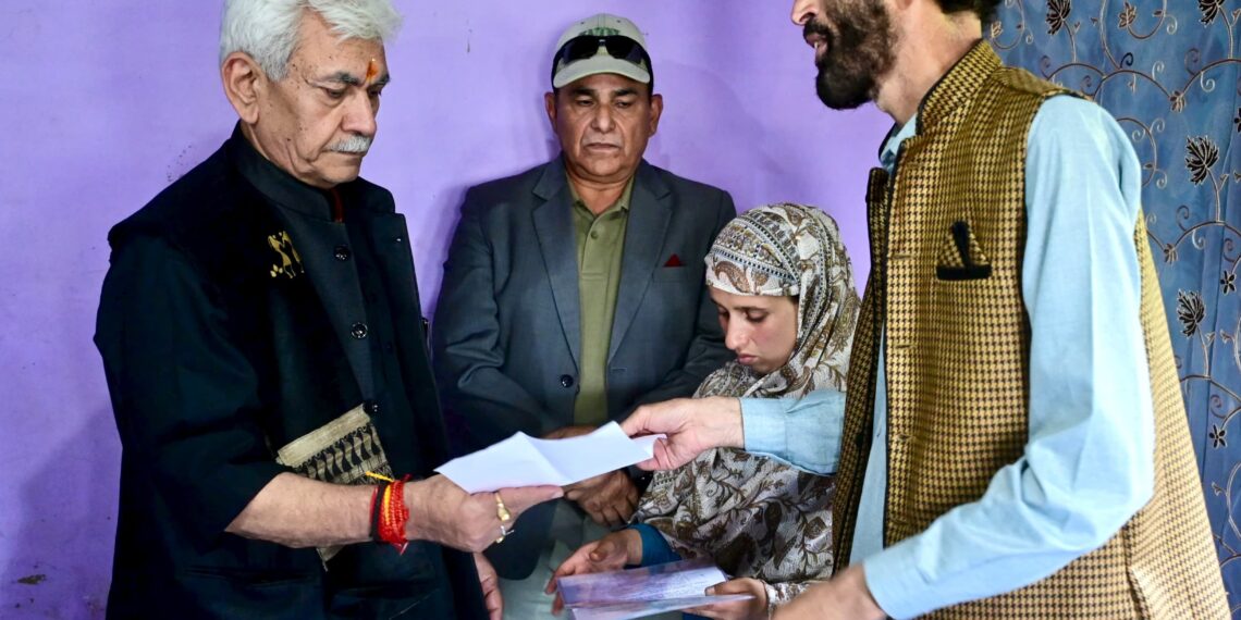 LG meets family of martyr Syed Adil Hussain at Anantnag, hands over appointment letter to his wife on compassionate ground
