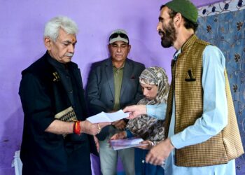 LG meets family of martyr Syed Adil Hussain at Anantnag, hands over appointment letter to his wife on compassionate ground