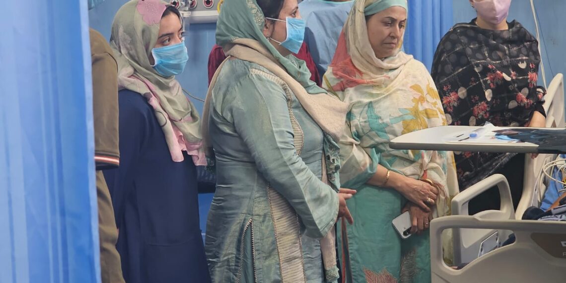 Health Minister visits local hospital to check on ailing former MLA Dr. Ghulam Nabi Bhat