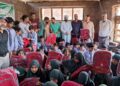 Amrit Charitable Trust, Kochhar Foundation Distribute School Bags Among Meritorious Students in Tral
