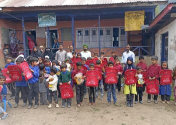 Amrit Charitable Trust Distributes Educational Kits Among Students in Tral